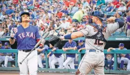  ?? Rodger Mallison / Fort Worth Star-Telegram ?? The Rangers’ Shin-Soo Choo strikes out with the bases loaded in the second inning against Astros starter Charlie Morton. Texas left 17 runners on base.