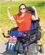  ?? COURTESY OF YVETTE MARIE WILSON ?? Yvette Marie Wilson is a wonder woman of sorts, battling ALS with optimism and hope, and getting around in a wheelchair she calls Big Red.