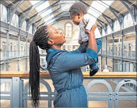  ??  ?? Mercy Baguma’s partner Eric Nnanna, left, lights a candle at the vigil in Elder Park, Govan yesterday, and above, the mum holding baby son Adriel at the Briggait in Glasgow in July last year