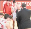  ?? Peter Wallace / For Hearst Connecticu­t Media ?? Wamogo coach Gregg Hunt smiled at his Warrirors’ defensive effort in their win over Nonnewaug at the top of the Berkshire League Tuesday night at Wamogo High School.