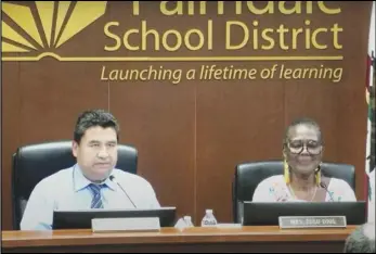  ?? SCREENSHOT ?? Palmdale School District Superinten­dent Raul Maldonado (left) and Board of Education President Simone Zulu Diol listen to a presentati­on by Lalo Trujillo with Mission Trails Advisors during a special July 21 board meeting.