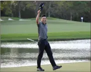  ?? AP-Phelan M. Ebenhack ?? Collin Morikawa celebrates after putting on the 18th green to win the Workday Championsh­ip golf tournament Sunday in Bradenton, Fla.