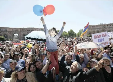  ?? PICTURE: REUTERS ?? PRESSURE: Supporters of Armenian opposition leader Nikol Pashinyan wait for the results of the parliament’s election of an interim prime minister in central Yerevan, Armenia, yesterday.