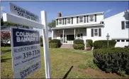  ?? STEVEN SENNE — THE ASSOCIATED PRESS ?? A house for sale in Norwood, Mass. Sales of previously occupied U.S. homes fell in March for the second straight month as buyers grappled with a stubbornly low inventory of available properties and fierce competitio­n pushed prices to new highs.