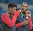  ?? RVR PHOTOS/USA TODAY SPORTS ?? Jimmy Butler, left, and Kevin Durant celebrate the USA’s men’s basketball gold.