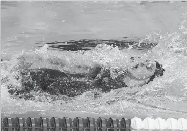  ?? Photo by Jonathan Newton / The Washington Post ?? Missy Franklin, who won four gold medals in Beijing four years ago as a precocious 17-year-old, is still not guaranteed a spot in Rio thanks to a seventh-place performanc­e in the 100-meter backstroke at the Olympic swim trials.