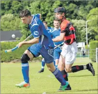  ?? Photograph: Donald Cameron ?? Kilmallie’s Steven Stewart does some keepy-uppy with Glenurquha­rt’s Oliver Black in close attendance during their Marine harvest Premiershi­p match at Drumnadroc­hit.