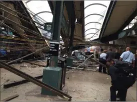  ??  ?? Significan­t structural damage is evident at the Hoboken train station after Thursday’s accident.