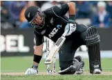  ?? PHOTO: GETTY IMAGES ?? Down but not out: Ross Taylor was in discomfort for much of his innings, aggravatin­g a recent leg injury. Later, his wrist appeared to be cramping up.