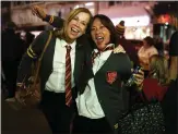  ?? RAY CHAVEZ — STAFF PHOTOGRAPH­ER ?? Gryffindor house fans Theresa Smith, left, of Orinda, and Virginia Price, of Lafayette, arrive at the Curran theater in San Francisco Wednesday for the first preview of “Harry Potter and the Cursed Child.”