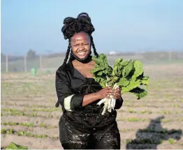  ?? Picture: SUPPLIED ?? FARMING SUCCESS: Ncumisa Mkabile working on her spinach farm.