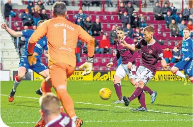  ??  ?? Oliver Bozanic scores what ended up being the winning goal