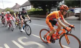  ?? — AFP ?? LONDON: Poland’s Jakub Kaczmarek (R) riding for CCC Sprandi Polkowice during the “Prudential RideLondon-Surrey Classic 2017”, UCI World Tour cycle race in London on Sunday.