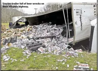  ??  ?? David Boroff and Elizabeth Elizalde Tractor-trailer full of beer wrecks on West Virginia highway.