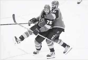  ?? ASSOCIATED PRESS FILE PHOTO ?? Vegas Golden Knights’ Ryan Reaves, left, celebrates his goal with Pierre-Edouard Bellemare in Game 1 of the Stanley Cup final against Washington on Monday. For Wednesday’s Game 2 result, see therecord.com.