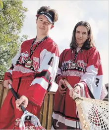  ?? PETER LEE WATERLOO REGION RECORD ?? Kyler Francis, left, and Markus Madill won gold medals with Ontario’s squad at the national bantam lacrosse championsh­ip.