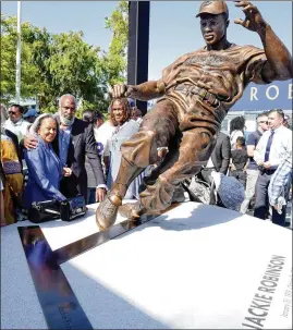 ?? KEITH BIRMINGHAM / PASADENA STAR-NEWS 2017 ?? Jackie Robinson’s widow, Rachel, and son David attend the Dodgers’ statue unveiling last April 15, 70 years after he broke MLB’s color barrier.