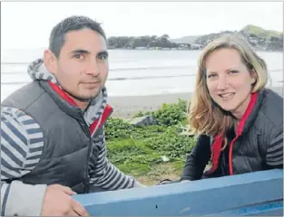  ??  ?? Loving the Bay: Brodie Macgregor and Alison Watts know the power of social media today and they view a Facebook page dedicated to Titahi Bay as a way to connect more with their neighbours and wider community.