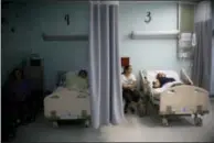  ?? THE ASSOCIATED PRESS ?? Patients lie in their beds at a hospital in Catano, Puerto Rico. The U.S. Food and Drug Administra­tion says drug shortages are possible because of expected long-term power outages in Puerto Rico.