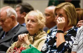  ?? REBECCA WRIGHT / FOR THE AJC ?? Collins High School Principal Kerensa Wing tears up watching a presentati­on Monday that highlighte­d her dedication to the students and teachers at her school as she was recognized as National Principal of the Year.