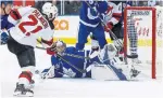  ?? RICK MADONIK TORONTO STAR ?? Leafs goaltender Frederik Andersen makes a save against Devils right wing Kyle Palmieri on Friday.