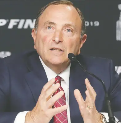  ?? BRUCE BENNETT / GETTY IMAGES FILES ?? Commission­er Gary Bettman says “it was only a matter of time” before an NHL player tested positive for coronaviru­s, given that players used the same spaces that an infected NBA player had recently used.