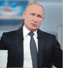  ?? MIKHAIL KLIMENTYEV THE ASSOCIATED PRESS ?? Russian President Vladimir Putin answers a question during his annual call-in show in Moscow on Thursday. Putin hosts shows every year to provide a platform for ordinary Russians to appeal to the president.