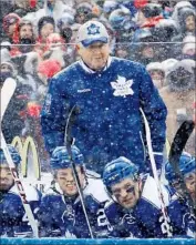  ?? Gregory Shamus Getty Images ?? RANDY CARLYLE, shown in 2014 coaching the Maple Leafs , was fired by the team in 2015.