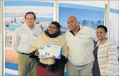  ?? Picture: RIAAN MARAIS ?? PROUD MOMENT: Wessa chief executive Dr Thommie Burger, left, and Tourism Minister Tokozile Xasa, right, hand over certificat­es for three beaches in Nelson Mandela Bay that were awarded Blue Flag status at the national Blue Flag launch in Jeffreys Bay...