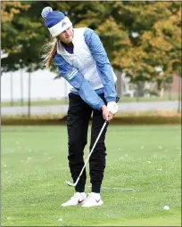  ?? JASON SCHMITT — FOR MEDIANEWS GROUP ?? Marian’s Shannon Kennedy hits a chip during the Division 3 state tournament last month. Kennedy won the individual state title and led the Mustangs to the team championsh­ip as well.