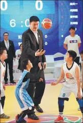  ?? XINHUA ?? Yao Ming, chairman of the Chinese Basketball Associatio­n, is championin­g a nationwide minibasket­ball program that benefits kids both on and off the court.