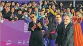  ?? JIANG DONG / CHINA DAILY ?? Some jury members of the Beijing Internatio­nal Film Festival make their debut on the red carpet on Sunday.