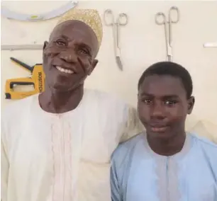 ?? Adewole Ajao, ICRC ?? Musa’s father is hopeful about his son’s future, especially since he can now walk with his new limb. PHOTO:
