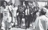  ??  ?? The Rev. Al Sharpton leads a rally after the murder of Yusuf Hawkins, who was killed in the largely white neighborho­od of Bensonhurs­t in Brooklyn, Aug. 26, 1989.