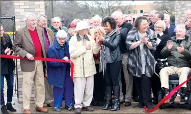  ?? Photos by Michael Shine/News-Times ?? Ribbon cutting: Cecil Kellum and Mayor Veronica Smith-Creer cut the ribbon together as part of the ceremony.