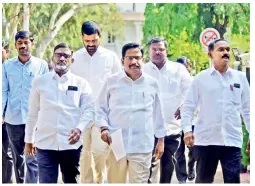  ?? — S. SURENDER REDDY ?? Mahbubnaga­r MLA Yennam Srinivasa Reddy and others come out of the office of the DGP requesting him to conduct a more in-depth investigat­ion into the phone tapping on Tuesday.