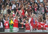  ??  ?? Salvaged...Arsenal lift the FA Cup