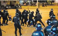  ?? SERGEI GRITS THE ASSOCIATED PRESS ?? Police use truncheons on a protester during a mass protest following the presidenti­al election in Minsk, Belarus, on Monday.