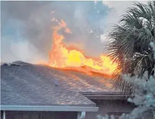  ?? JAMES BALBONI/COURTESY ?? Witnesses said the Oakland Park apartment fire began about 5:45 a.m. Monday. Crews from five different agencies had the blaze under control by 7 a.m. As many as 16 units were damaged by fire or smoke.