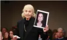  ??  ?? Marcia Zucker holds up a photo of her daughter, Helene Seeman, during the first sentencing in 2013. Photograph: Patti Sapone/AP