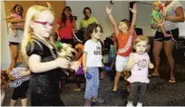  ?? ORLANDO SENTINEL FILE PHOTO ?? Children dance at the Eustis Memorial Library. Groups are working to ensure that kids are accurately counted in the 2020 Census.