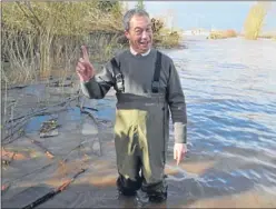  ?? Pictures: PA. ?? Ukip leader Nigel Farage in the floodwater at Burrowbrid­ge.