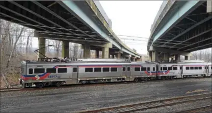  ?? PETE BANNAN – DIGITAL FIRST MEDIA ?? In this March photo, SEPTA’s Thorndale line passes underneath Route 202 in East and West Whiteland. Work has begun to upgrade the road above the tracks, and it’s leading to some backups, motorists complain.