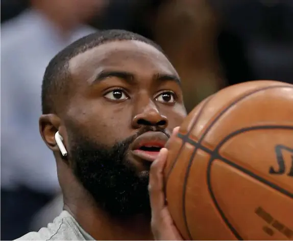  ?? STUART CAHILL / HERALD STAFF FILE ?? ‘I’LL BE FINE’: Celtics guard Jaylen Brown played against the Houston Rockets Tuesday night despite nursing sprained ankles.