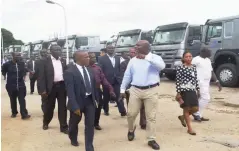  ??  ?? Project manager, Dangote Group, Tijani Momodu conducting Journalist­s round Dangote Sinotruck assembly plant, at Oba Akran in Lagos.