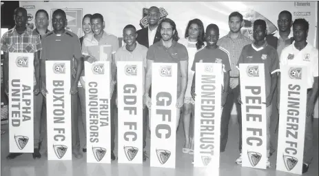  ?? (Orlando Charles photo) ?? The eight captains of the participat­ing teams of the Guyana Football Federation’s upcoming Elite League pose for a photo opportunit­y at Saturday’s launch.