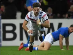  ?? (Getty) ?? Hugo Bonneval dives over to score try for France