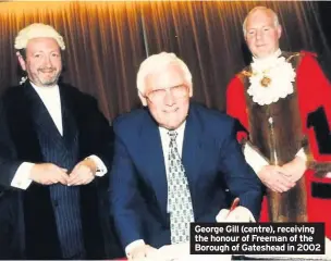  ??  ?? George Gill (centre), receiving the honour of Freeman of the Borough of Gateshead in 2002