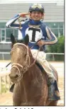  ?? (The Sentinel-Record/Richard Rasmussen) ?? Jockey Gabriel Saez, returns to the winner’s circle after riding Mr. Big News to victory in the Oaklawn Stakes on Saturday in Hot Springs.