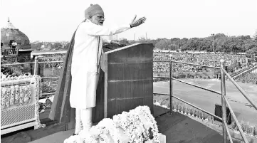  ??  ?? Modi gestures while delivering his speech as part of India’s 72nd Independen­ce Day celebratio­ns, which marks the 71st anniversar­y of the end of British colonial rule, at the Red Fort in New Delhi. — AFP photo